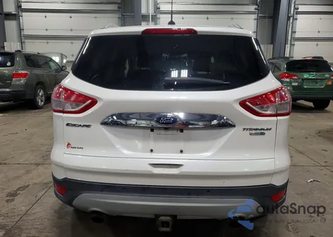 2015 Ford Escape Titanium z USA, uszkodzony, nr VIN 1FMCU9J94FUC26204